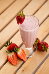 Glass of Strawberry Juice with Milk – Fresh Creamy Pink Smoothie Photography