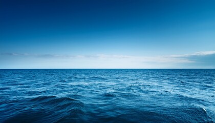 Obraz premium low angle view of minimalist ocean horizon with serene blue tones