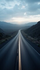 A two lane road leading to the sun in the distance.