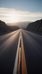 A long empty road with two yellow lanes going down it.