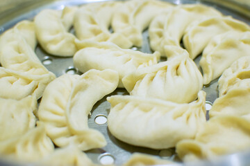 Close up of Momo, type of South Asian dumpling; native to Tibet, Nepal, Bhutan and Sikkim. It is...