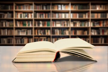 Reading book with open pages on library background