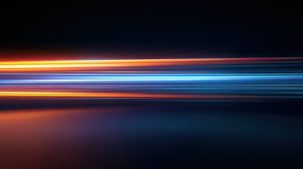 Abstract image of multiple horizontal light streaks in vibrant colors, including orange, yellow, and blue, against a dark background.  A sense of speed and motion is implied