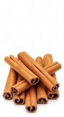 Close-up of aromatic cinnamon sticks and ground cinnamon, perfect for cooking, baking, and cozy flavors.