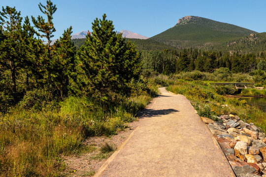The trail around Lily Lake within Rocky Mountain National Park, Colorado in early August, looking torward Estes Cone, and then Longs Peak