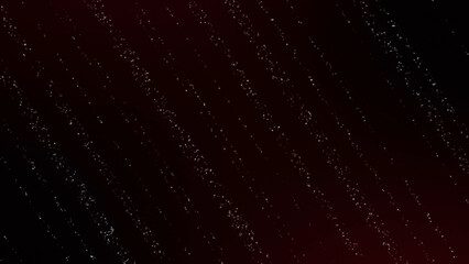 Glitter particle strings on dark red and black gradient background