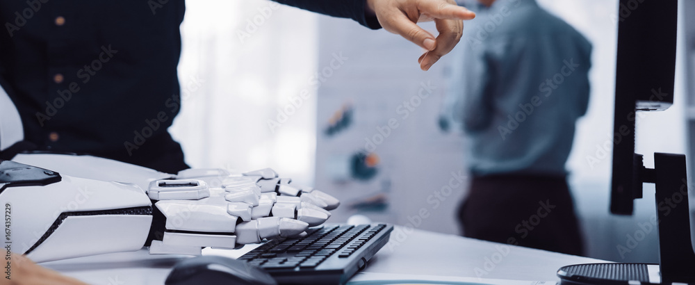 Poster a futuristic office scene featuring a humanoid robot hand pointing at a screen, illustrating the syn