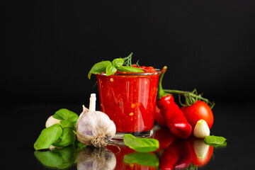 Tasty homemade sauce with garlic pepper and tomato