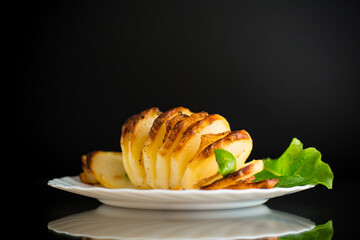 A hearty dish - potatoes from the oven with lard