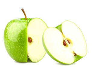 Green apple sliced showing seeds on a white surface