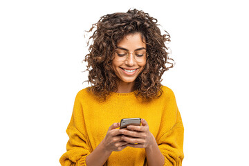 Young woman uses phone. Smiling woman wearing yellow sweater checks her phone. Lifestyle, social media, ads.
