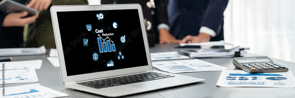 Poster cost reduction, cost saving concept shown on computer screen brisk, corporate business efficiently s