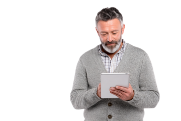 Mature man uses tablet; stock image features modern digital lifestyle. Ideal for ads or product photography.