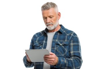 Mature Man Uses Tablet. Silver-haired person with blue shirt holds technology, looking down. Use for tech marketing, senior lifestyle, product photography.
