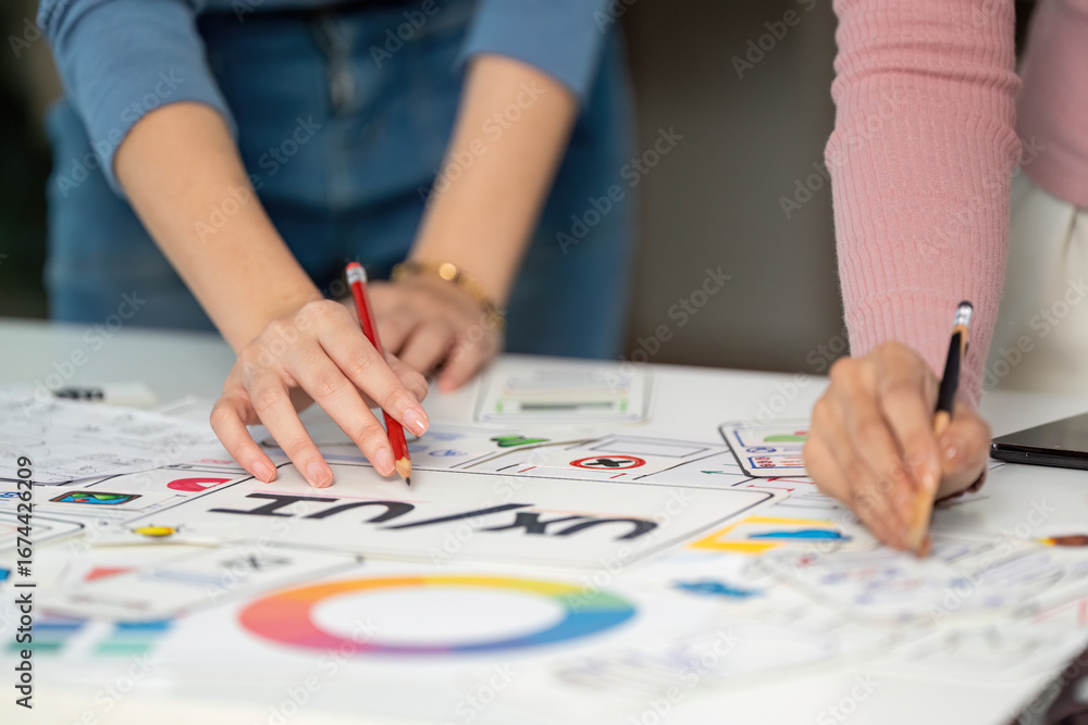 Aufkleber ux and ui design collaboration. creative team brainstorming on user interface concepts.