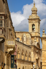 View of main Villegaignon Street with facades of histoical buldings, Malta, Mdina