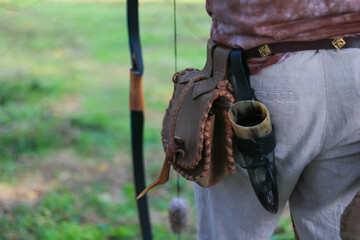Leather quiver and holster in nature