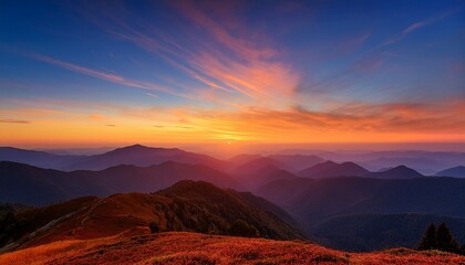 Naklejka premium a stunning gradient landscape features layered mountains under a vibrant sunset warm hues blend beautifully creating a serene and captivating atmosphere