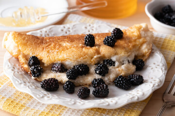 Omelette with blackberries