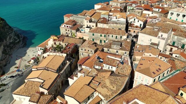 Flyover of Tropea buildings looking out to sea