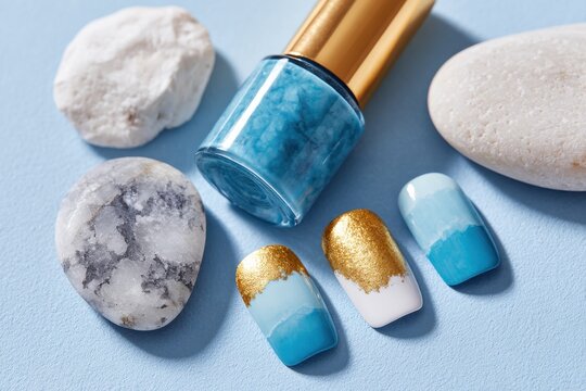 Nail polish and nail art samples creating a relaxing sea-inspired composition