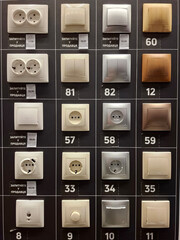 Many electric light switches in construction hypermarket