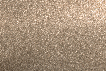 Glittery texture of gold shimmer with a smooth and festive appearance