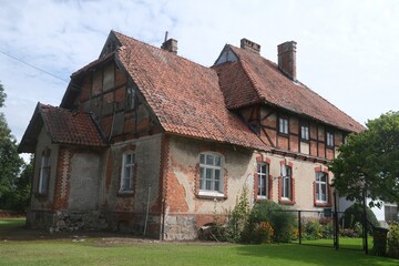 Abandoned brick manor house in the village of Awajki, Warmia, Poland	
