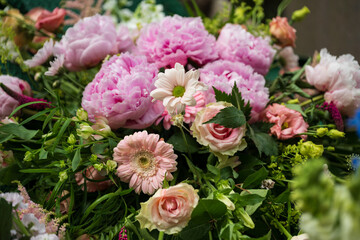 Closeup of lush bouquet with pink roses.