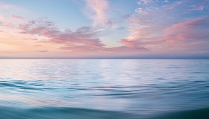 Fototapeta premium a serene pastel palette blending sea and sky in harmonious tranquility and gentle waves reflection