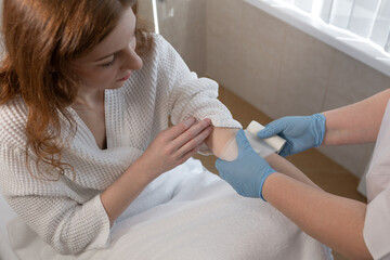 Patient undergoing routine blood test procedure in professional healthcare facility