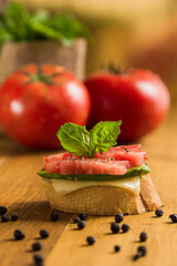Tomato and cheese bruschetta with basil