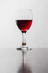 Glass of red wine with reflection