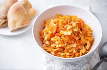 Tomato sauce cabbage stew in a bowl