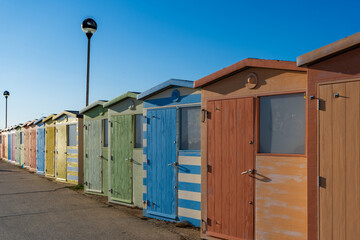 Naklejka premium Colourful beach huts in Seaford, East Sussex. 