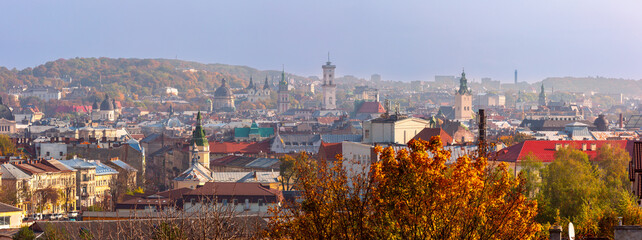 Autumn panoramic view of Lviv, Ukraine, showing historical skyline and colorful foliage