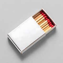 Blank matchbox with wooden matches and red tips on light gray background for packaging mockup design
