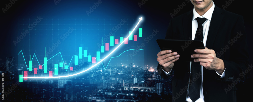 Poster a business professional examines financial data on a tablet while displaying a growing graph against