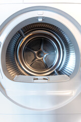 Dryer drum. Stainless texture. Home appliance
