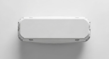Blank white cardboard egg carton, top view, minimalist design, studio shot.