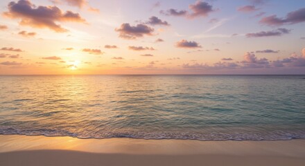 Obraz premium Tranquil Tropical Beach Sunset Over the Ocean