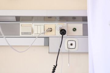 Hospital room power sockets. Medical equipment connections on the wall. Electric plugs and oxygen...