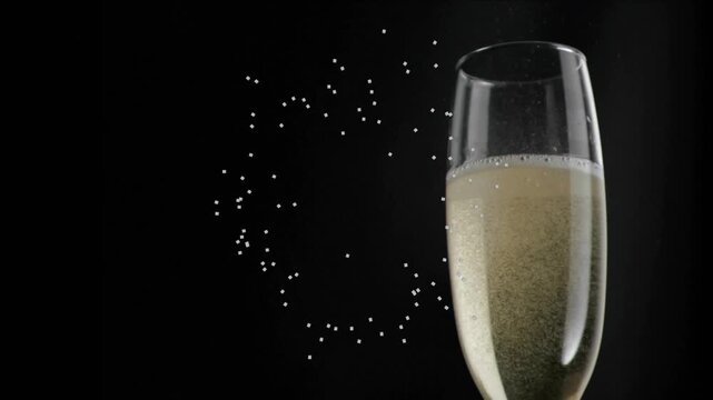 Hovering dotted circle transforming into particles, forming bright ring around flute for swirling