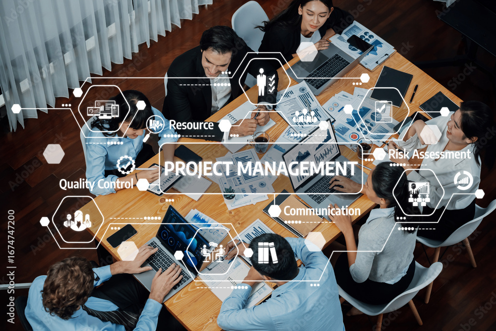 Poster a dynamic meeting scene showing a team engaged in project management, utilizing digital tools and co