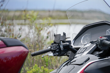 Red motorcycle parts details close up, shapes and forms of aerodynamic, cruiser moto 