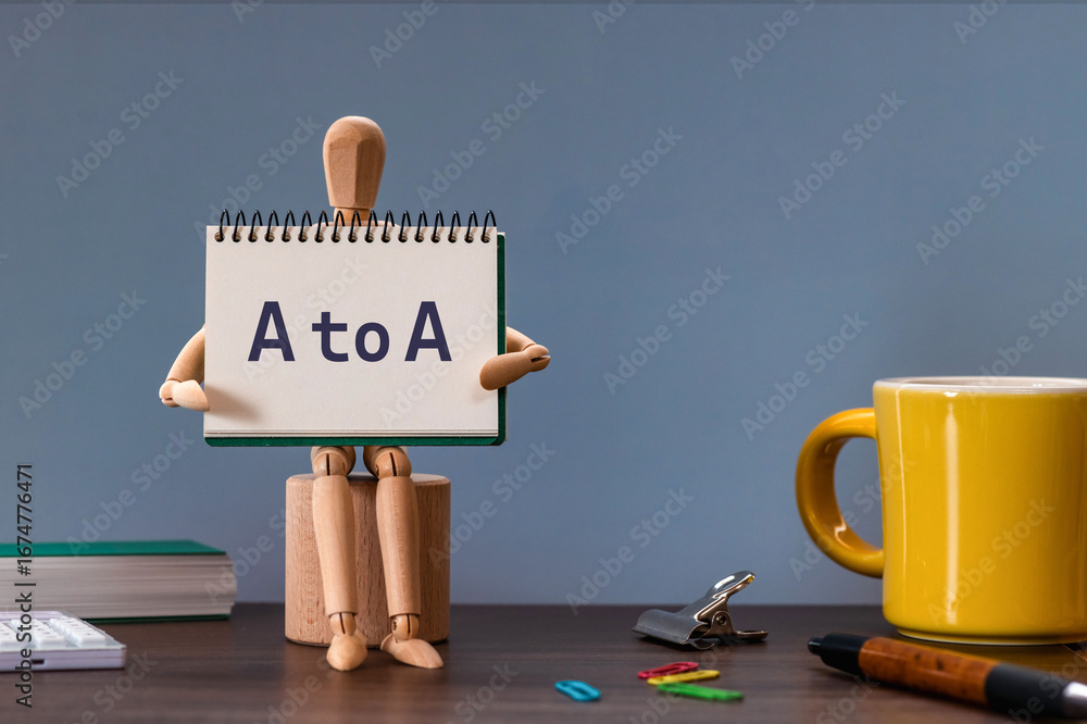Poster there is notebook with the word a to a. it is an abbreviation for agent to agent as eye-catching ima