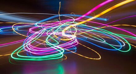 Vibrant abstract light painting with swirling neon lines creating a dynamic and energetic visual effect on a dark background