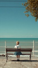 Girl sits on bench overlooking ocean, summer day.  Possible use postcard