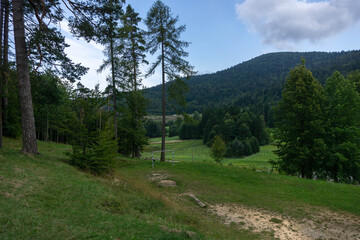 Small grass football field in Croatian mountains
