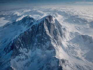 Snowy mountain peak, aerial view. Vast expanse of icy terrain